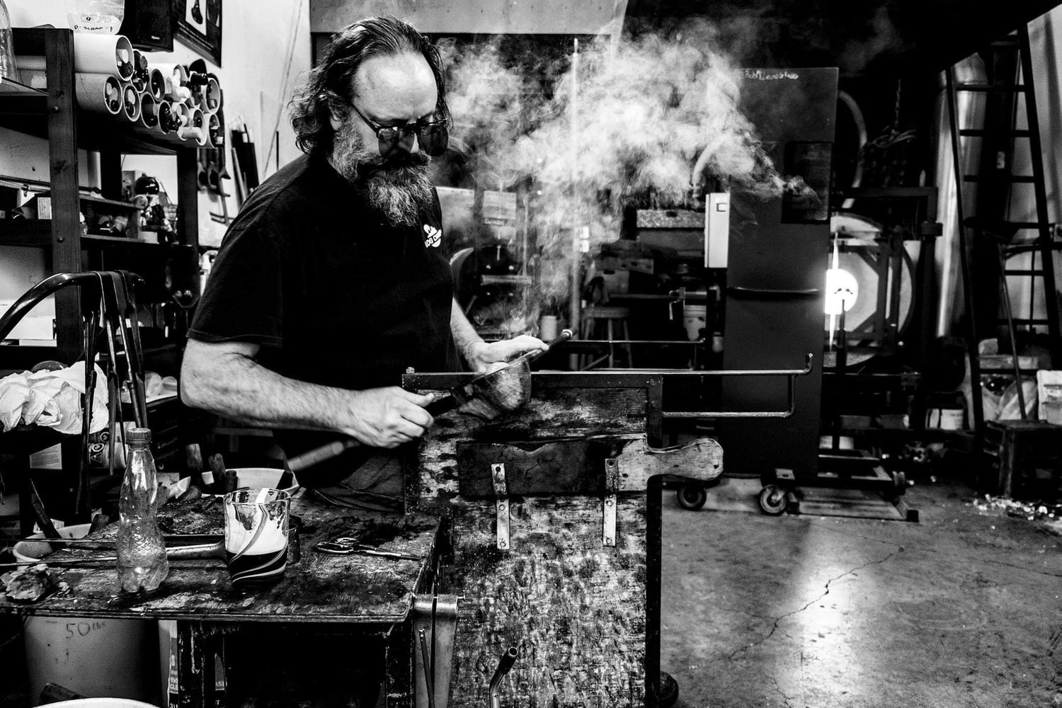 Bob at the Campbell River studio shaping glass ball